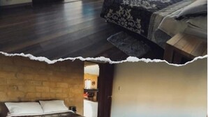 Una habitación con cama, una mesita y vistas al exterior.