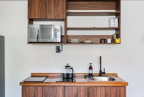 Fridge, microwave, stovetop, coffee/tea maker