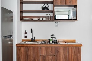 Fridge, microwave, stovetop, coffee/tea maker