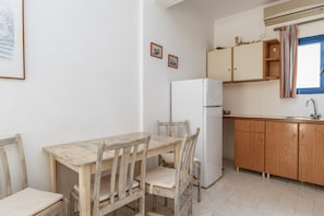 Fridge, stovetop, cookware/dishes/utensils