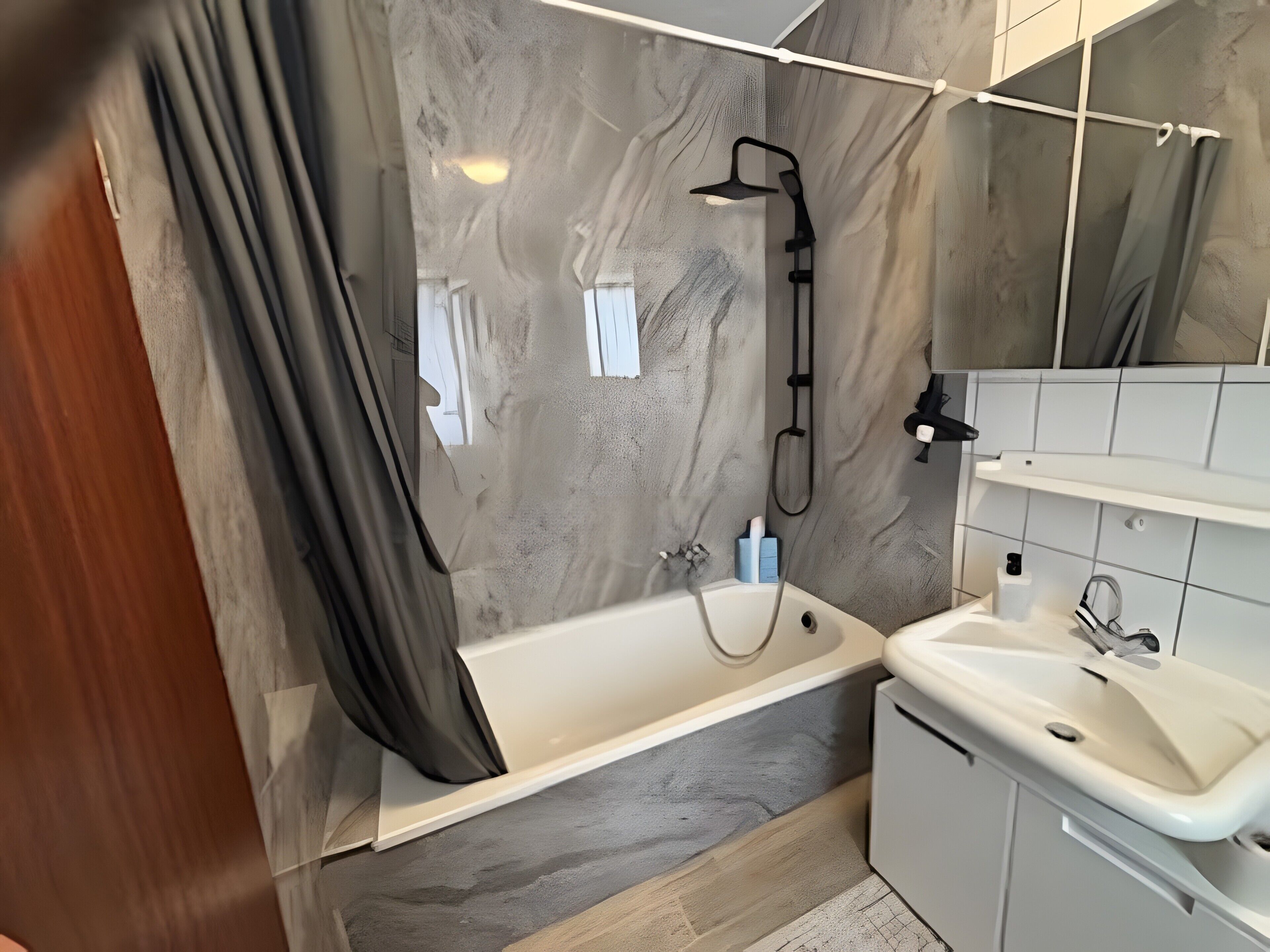 Bathtub, hair dryer, towels