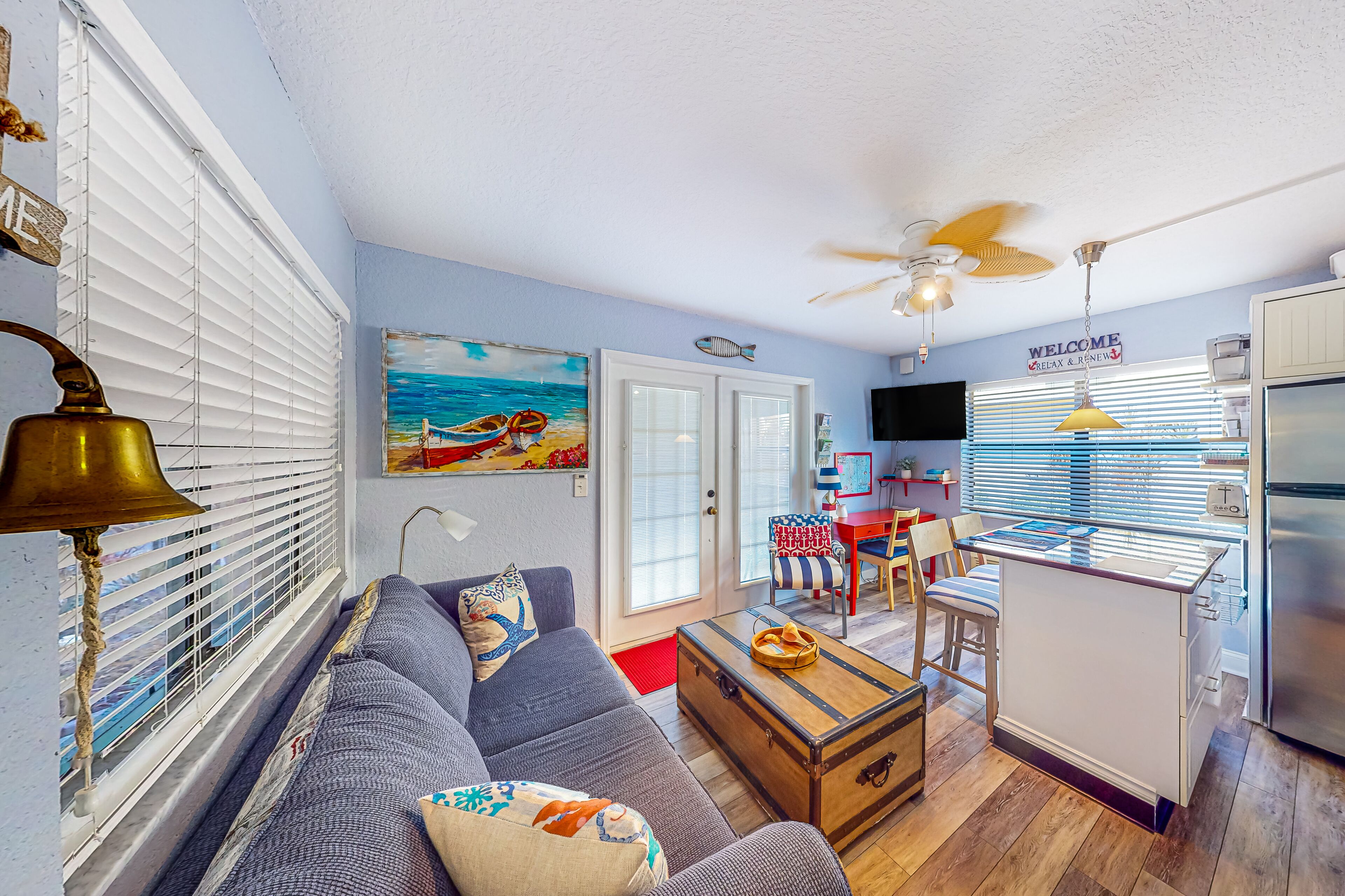 First-floor condo with courtyard-style pool, grills, & easy beach access