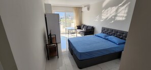 Basic Studio | Laptop workspace, bed sheets