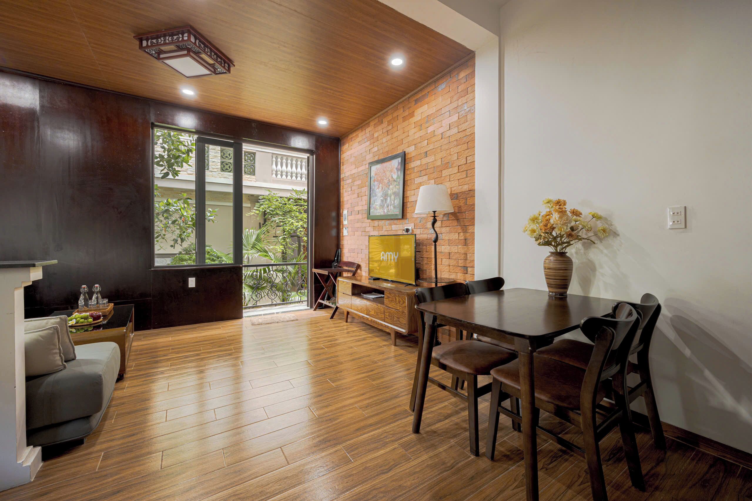 Deluxe Apartment, 2 Bedrooms | Living area | 42-inch Smart TV with cable channels