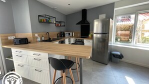 Private kitchen - Cozy 6-Person Cottage in Chanverrie with Private Bathrooms, Kids' Play Area, and Terrace (Chanverrie)