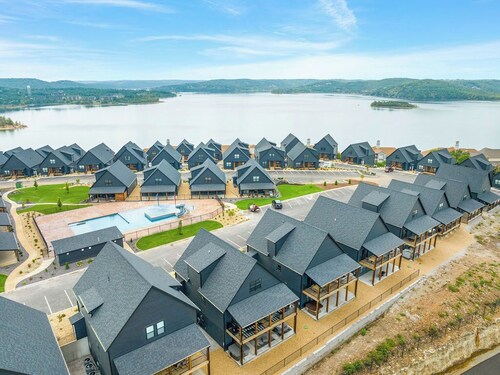 Natural Beauty awaits at this 7 bedroom home overlooking the lake!