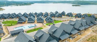 Natural Beauty awaits at this 7 bedroom home overlooking the lake!