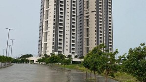 Two high-rise residential buildings with a modern architectural design, featuring multiple balconies and a uniform facade. - Luxury 3-Bedroom Apartment at Eko Pearl, Eko Atlantic, Victoria Island, Lagos. (Lagos)