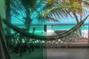 Quarto quádruplo, vista para o mar | Varanda coberta