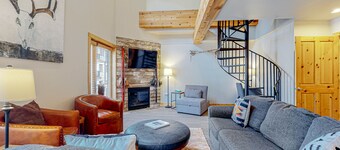 Ski-in/out condo with mountain views, central location, & fireplace