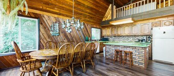Sound view home full of vintage charm with game room, wood stove, & gas grill