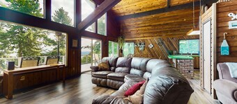 Sound view home full of vintage charm with game room, wood stove, & gas grill