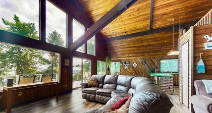 Sound view home full of vintage charm with game room, wood stove, & gas grill