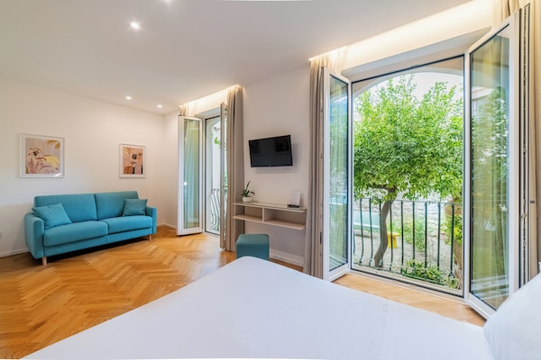 Premium bedding, memory foam beds, minibar, in-room safe