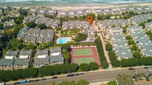 An aerial view of a residential area with houses, a swimming pool, and a tennis court. - Ocean View Condo w/ Beach Access!Walk to Del Mar Track/Fair & Solana Train Stop (Solana Beach)