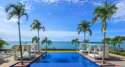 Beautiful apt on the beach, with wonderful cross breezes to keep you cool