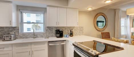 Condo, 2 Bedrooms | Private kitchen | Fridge, oven, stovetop, coffee/tea maker