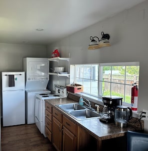 Fridge, microwave, stovetop, coffee/tea maker