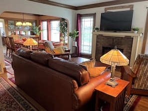 Smart TV, fireplace, books, music library