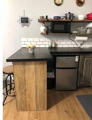 Fridge, microwave, coffee/tea maker, toaster