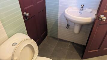 Shower, towels, soap, shampoo
