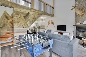 TV, fireplace, table football