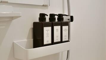 Bathtub, hair dryer, towels