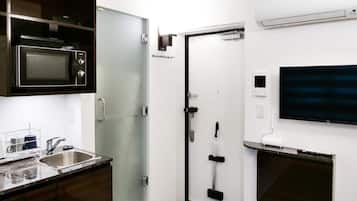 Fridge, microwave, electric kettle, cookware/dishes/utensils