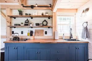 Microwave, stovetop, coffee/tea maker, toaster