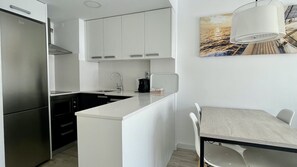 Fridge, microwave, dishwasher, coffee/tea maker