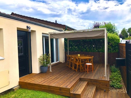 Outdoor dining. Small family house 100m2