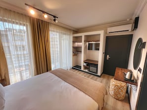 Deluxe kamer, 1 twee- of 2 eenpersoonsbedden | Lakens van Egyptisch katoen, luxe beddengoed, Select Comfort-bedden