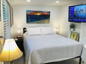 2 habitaciones, tabla de planchar con plancha y cuna de viaje 