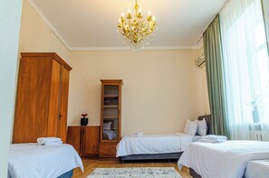 Basic Triple Room | Blackout drapes, iron/ironing board, free WiFi - Compass Hostel Moskovskaya (Bishkek)