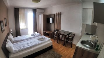 1 chambre, fer et planche Ă  repasser, Wi-Fi, draps fournis
