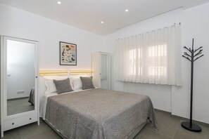 2 quartos, ferros/tábuas de passar roupa, berço de viagem, Wi-Fi