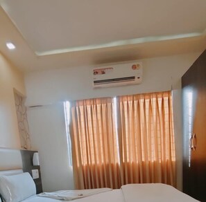 Quarto luxo | 1 quarto, Wi-Fi de cortesia