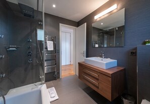 Bathtub, hair dryer, towels