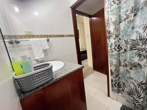 Hair dryer, towels, soap, shampoo