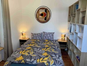 1 quarto, Wi-Fi de cortesia, roupa de cama