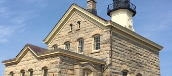 Located steps from Old Harbor and beaches 
Restaurants and shops one block away.