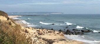 Located steps from Old Harbor and beaches 
Restaurants and shops one block away.