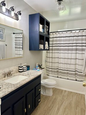 Hair dryer, towels, soap, shampoo