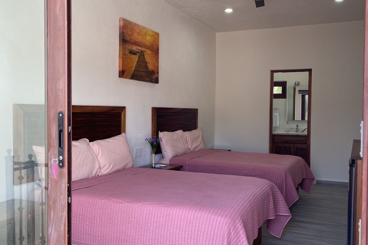 Basic Bungalow, 2 Queen Beds | Iron/ironing board, free WiFi