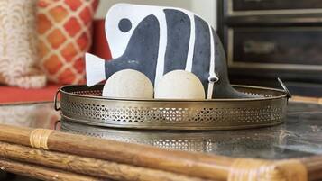 A tray with decorative items on a table.