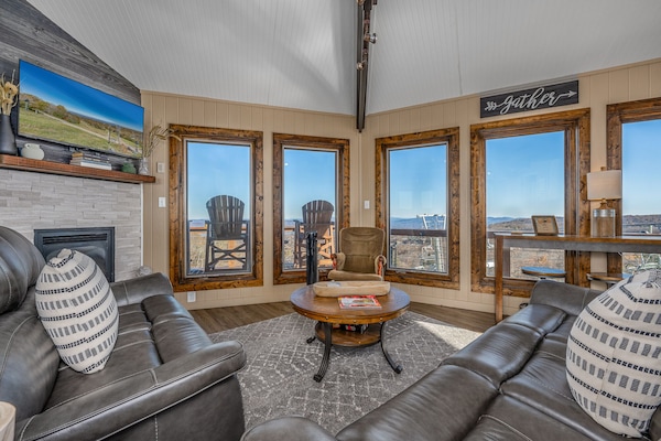 Smart TV, fireplace, books, stereo