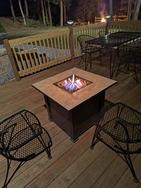 Outdoor dining - Beautiful cabin situated on wooded land with nice yard clearing and small stream (Madison)