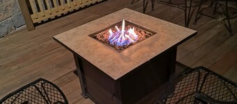 Beautiful cabin situated on wooded land with nice yard clearing and small stream