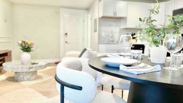 Deluxe Apartment | Living area | 55-inch Smart TV with cable channels, Netflix, Hulu
