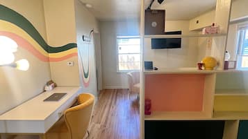 1 bedroom, desk, iron/ironing board, travel crib